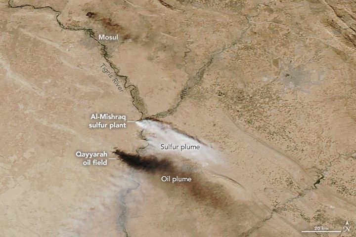 The Mishraq sulfur mine showing yellow native sulfur blocks and Frasch process extraction wells.