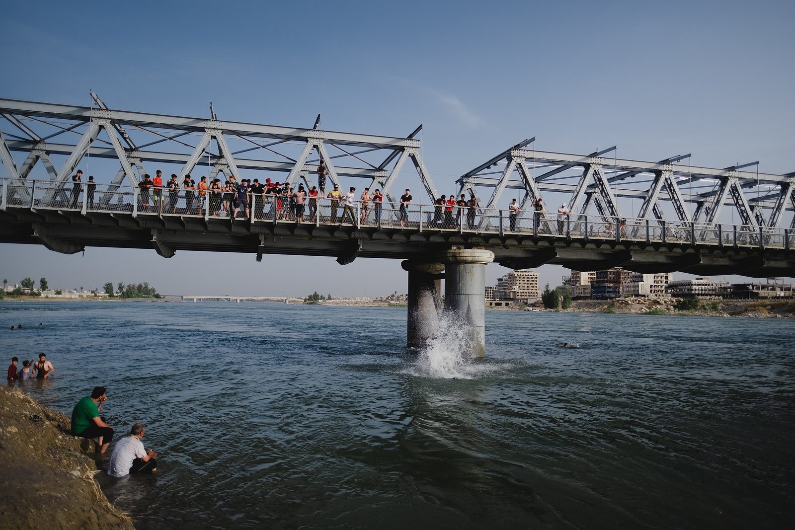 The Old Bridge (1st Bridge) over the Tigris in Mosul, with the cityscape of the Old City visible on the western bank.