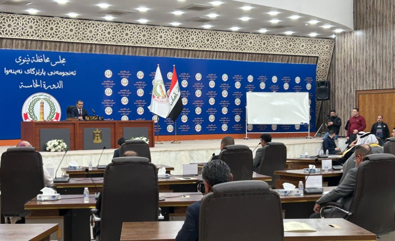 A session of the Nineveh Provincial Council in Mosul, with elected members in attendance.